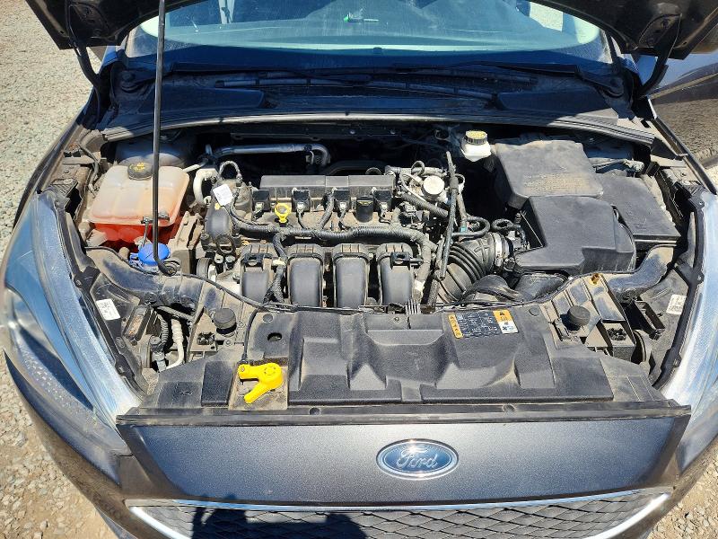 Photo 11 from auction – 2018 FORD FOCUS with VIN 1FADP3E20JL260574