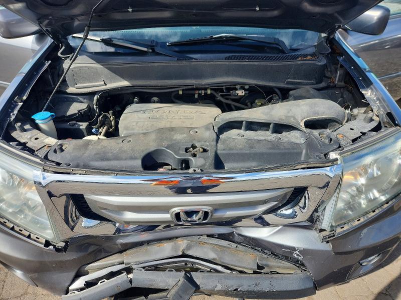 Снимка 12 от търг – 2011 HONDA PILOT с VIN 5FNYF4H50BB076587