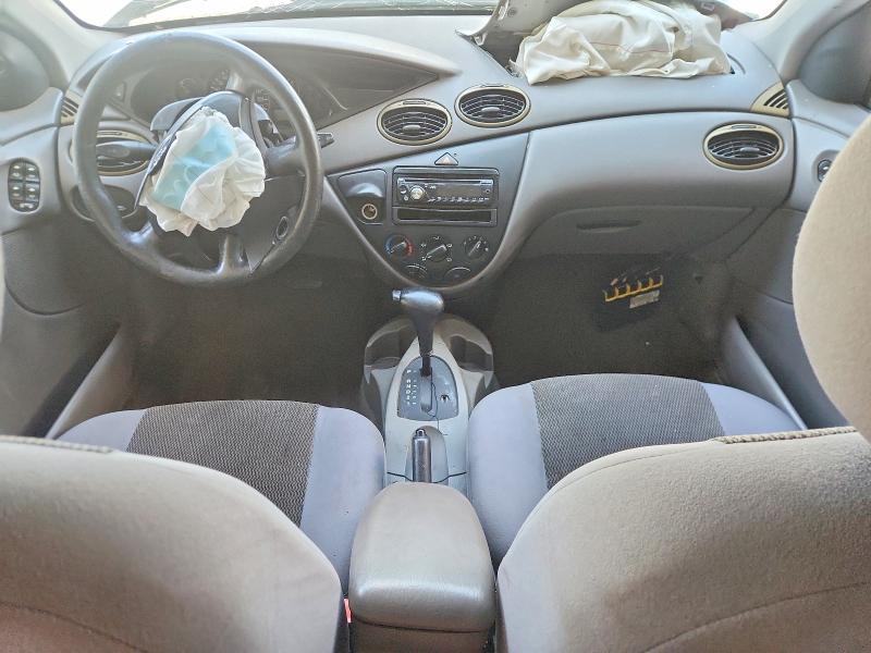 Снимка 8 от търг – 2004 FORD FOCUS с VIN 1FAFP36304W120494