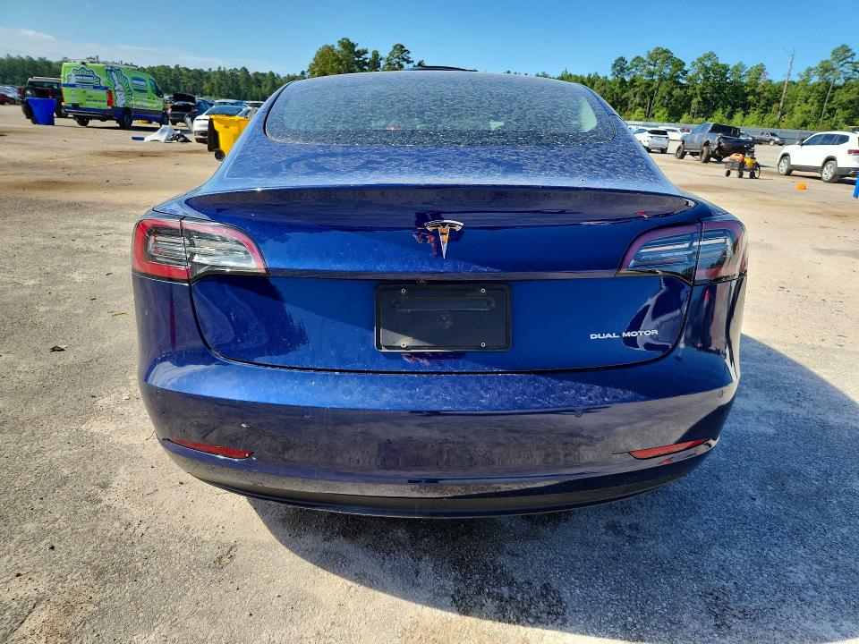 Photo 6 from auction – 2021 TESLA MODEL 3 with VIN 5YJ3E1EB4MF980435