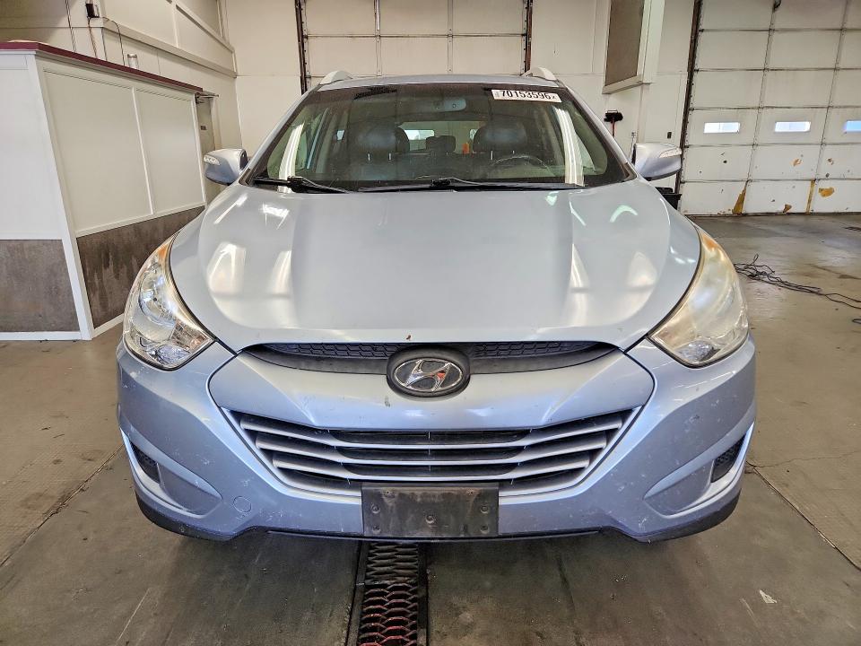 Photo 5 from auction – 2012 HYUNDAI TUCSON with VIN KM8JUCAC1CU396547