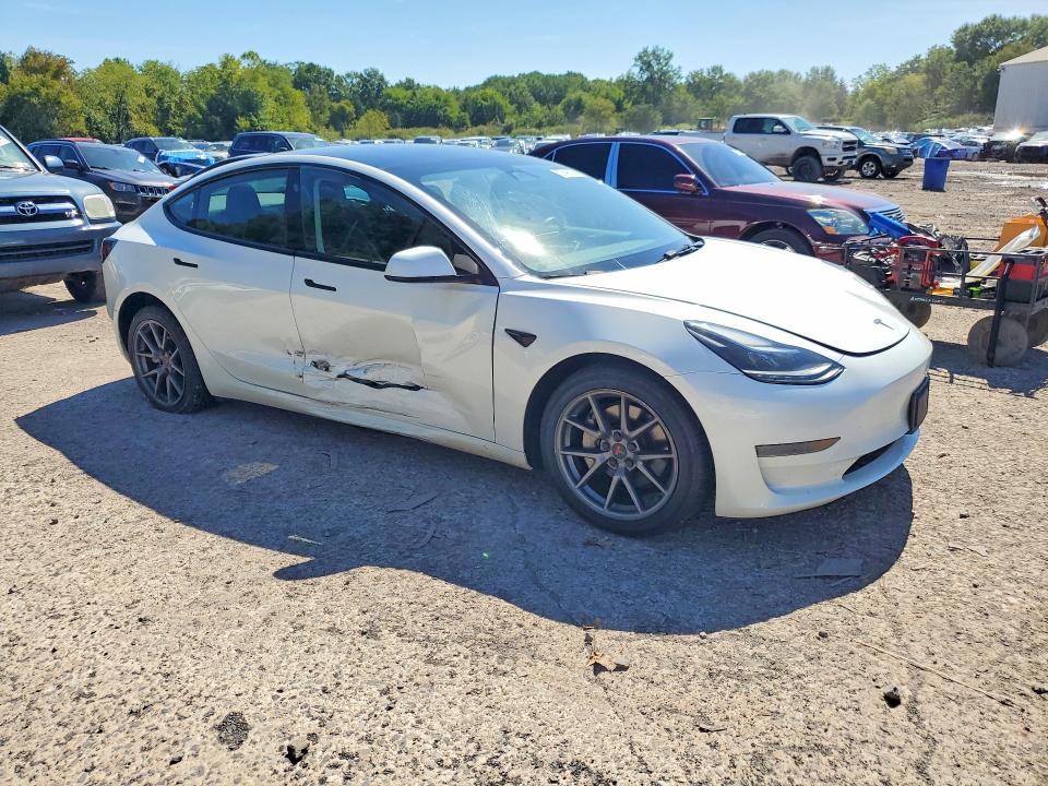 Снимка 4 от търг – 2023 TESLA MODEL 3 с VIN 5YJ3E1EA1PF459801