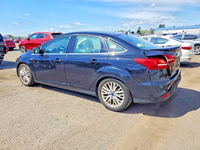 Photo 2 from auction – 2016 FORD FOCUS with VIN 1FADP3J27GL335074