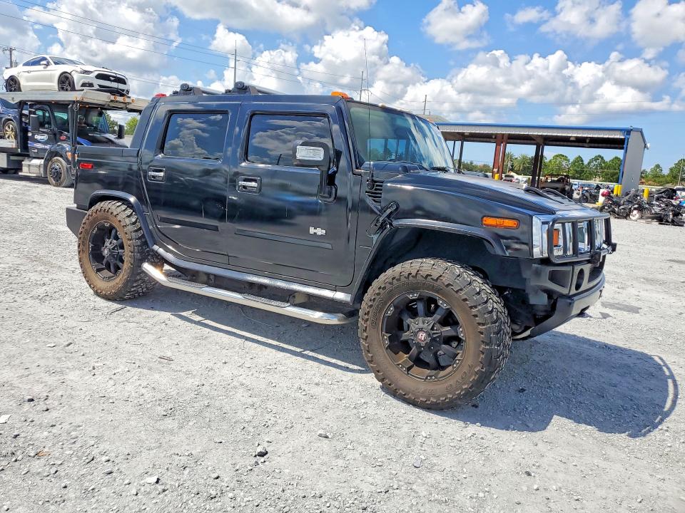 Photo 4 from auction – 2005 HUMMER H2 SUT with VIN 5GRGN22UX5H101324