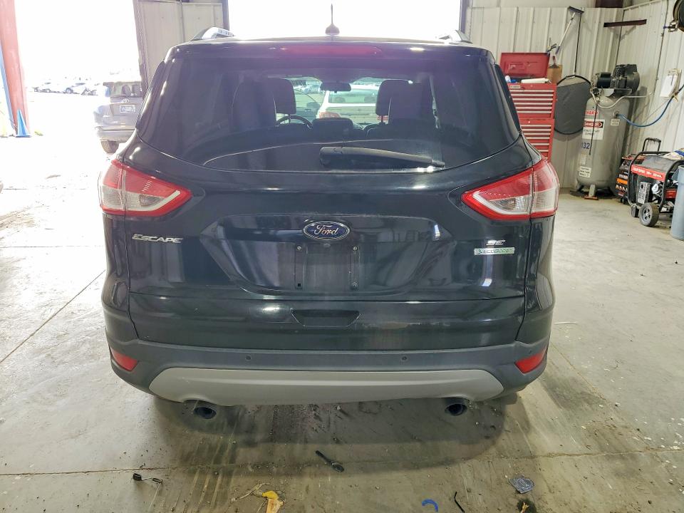 Photo 6 from auction – 2016 FORD ESCAPE with VIN 1FMCU0GX8GUA28891