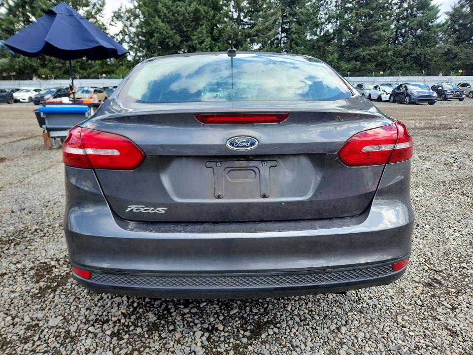 Foto 6 de la subasta – 2017 FORD FOCUS con VIN 1FADP3E27HL319257