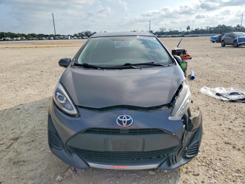 Снимка 5 от търг – 2020 TOYOTA PRIUS C с VIN JTDKDTB35L1636868
