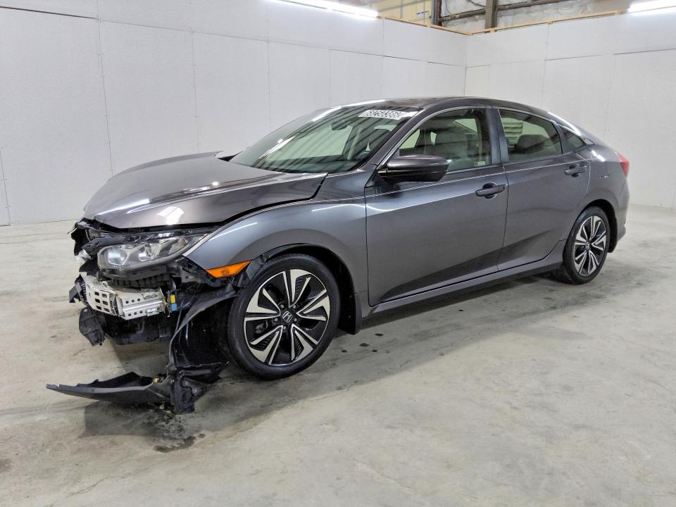 HONDA CIVIC 2018 with VIN JHMFC1F39JX005634 - Photo from auction
