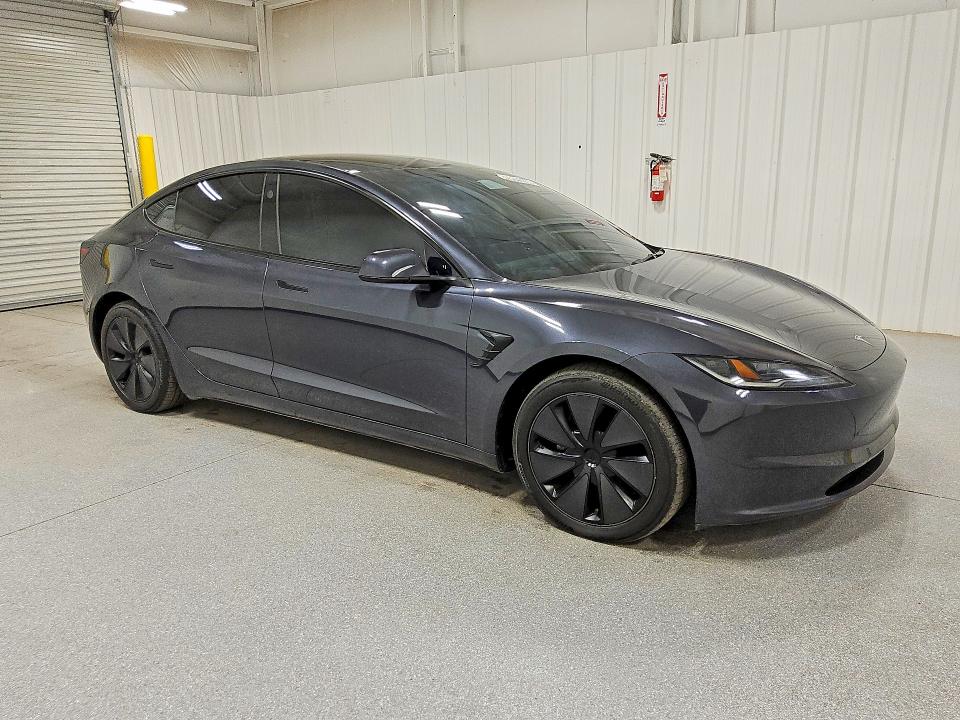 Снимка 4 от търг – 2024 TESLA MODEL 3 с VIN 5YJ3E1EB5RF843687