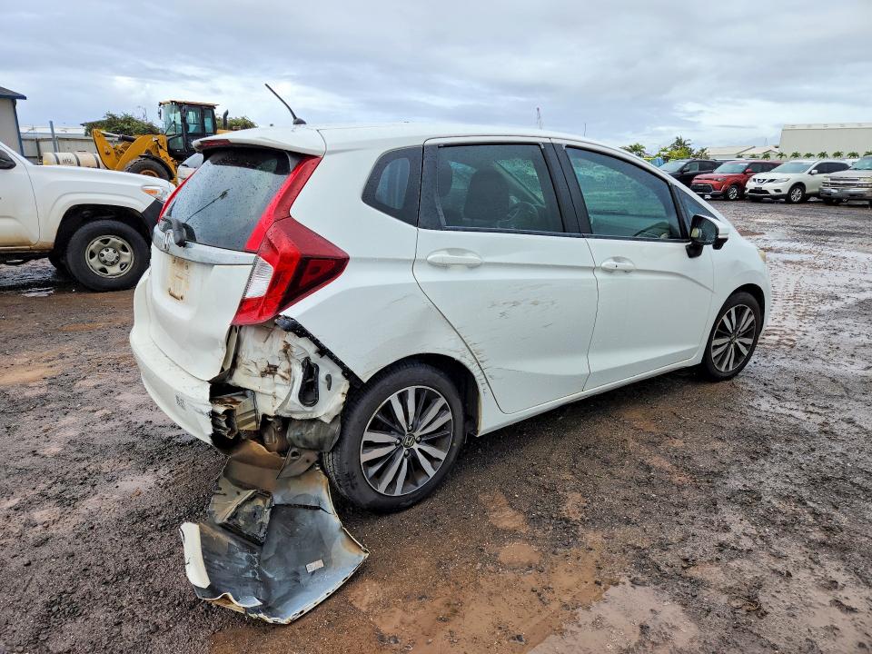 Снимка 3 от търг – 2016 HONDA FIT с VIN JHMGK5H70GX037346