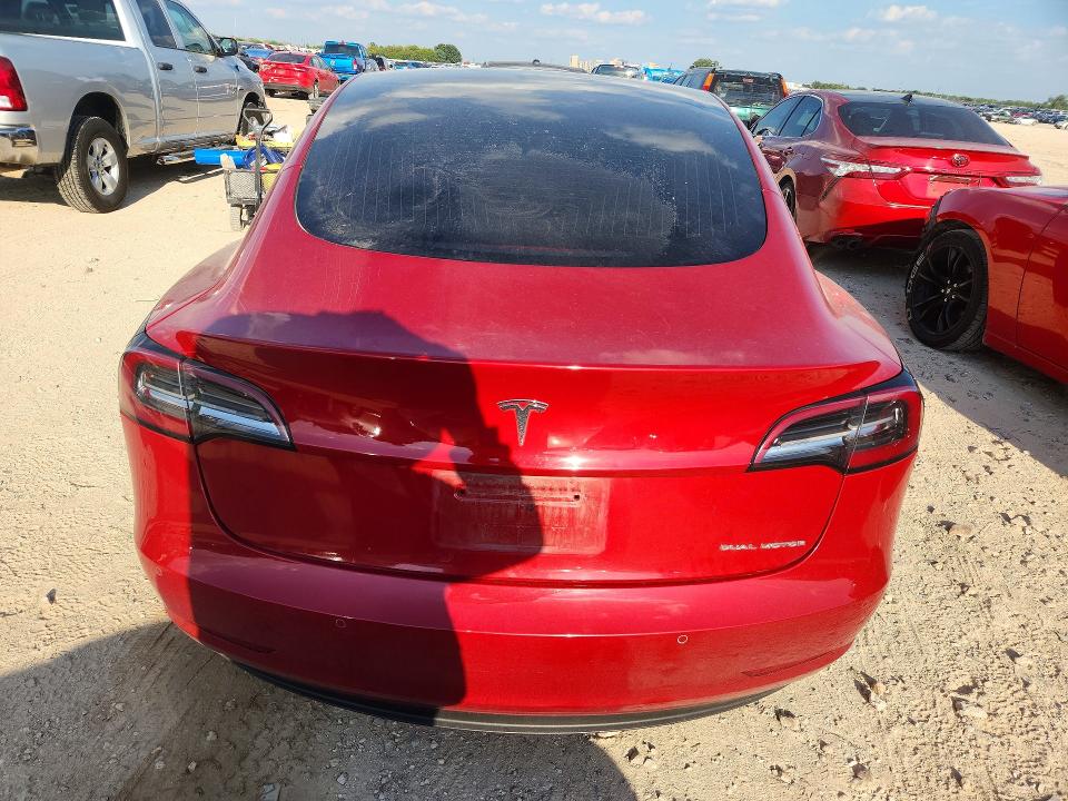 Снимка 6 от търг – 2018 TESLA MODEL 3 с VIN 5YJ3E1EB3JF064339