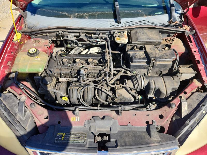 Photo 11 from auction – 2006 FORD FOCUS with VIN 1FAFP31N06W141552