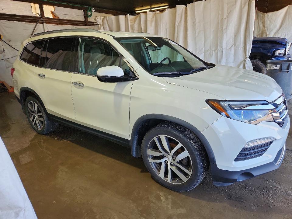 Foto 4 de la subasta – 2016 HONDA PILOT con VIN 5FNYF6H05GB113768