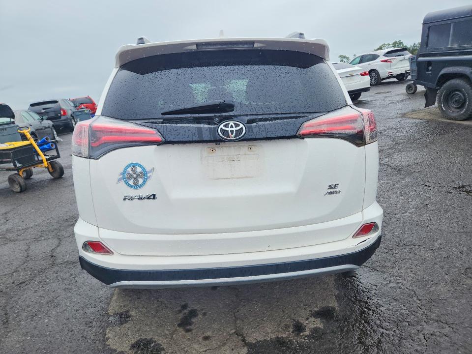 Photo 6 from auction – 2016 TOYOTA RAV4 with VIN 2T3JFREV8GW414144