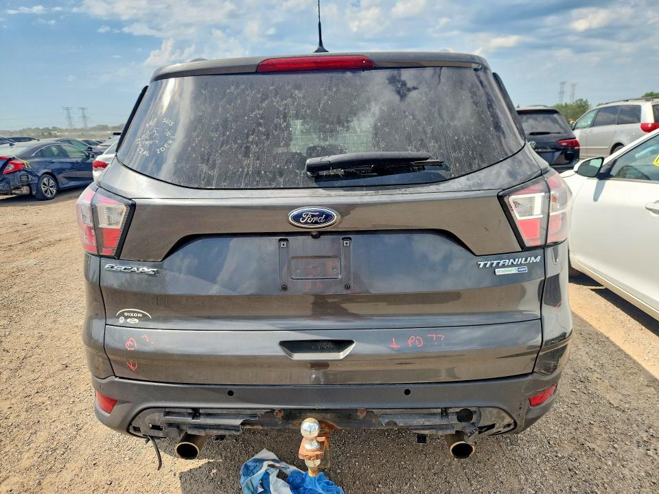 Photo 6 from auction – 2018 FORD ESCAPE with VIN 1FMCU9J98JUC20205