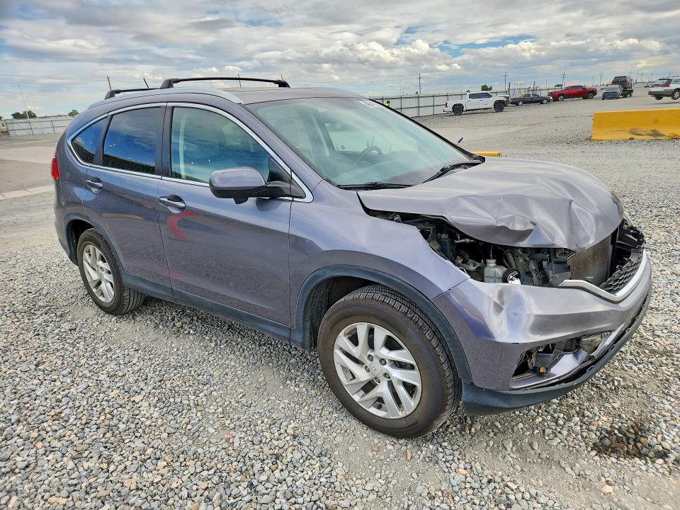 Photo 4 from auction – 2016 HONDA CR-V with VIN 5J6RM4H76GL010166