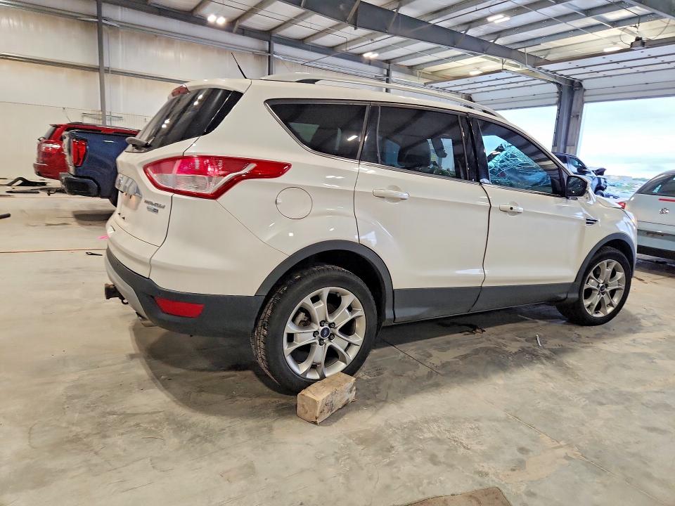 Снимка 3 от търг – 2014 FORD ESCAPE с VIN 1FMCU9J96EUE12499