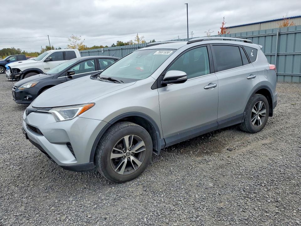 TOYOTA RAV4 2018 с VIN 2T3BFREV5JW810057 - Снимка от търг