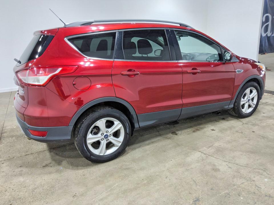 Снимка 3 от търг – 2016 FORD ESCAPE с VIN 1FMCU9GX4GUB56582