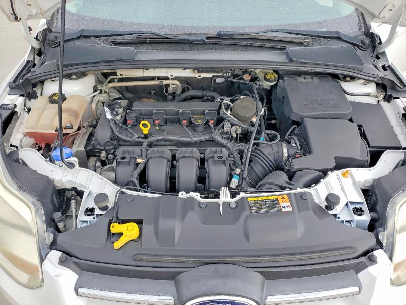 Foto 11 de la subasta – 2014 FORD FOCUS con VIN 1FADP3F25EL249493