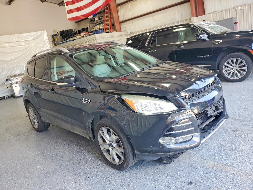 Photo 4 from auction – 2015 FORD ESCAPE with VIN 1FMCU0J90FUA68679