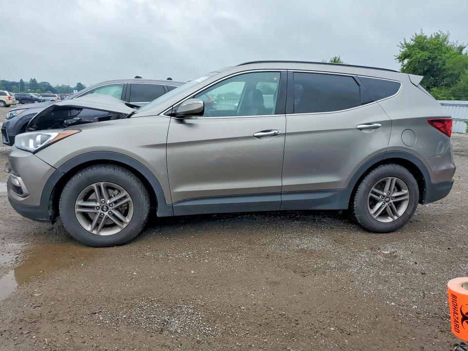 HYUNDAI SANTA FE SPORT 2018 с VIN 5XYZUDLB7JG540893 - Снимка от търг