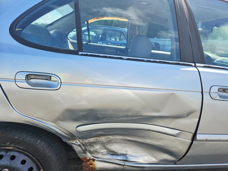Photo 10 from auction – 2004 NISSAN SENTRA with VIN 3N1CB51D44L487060