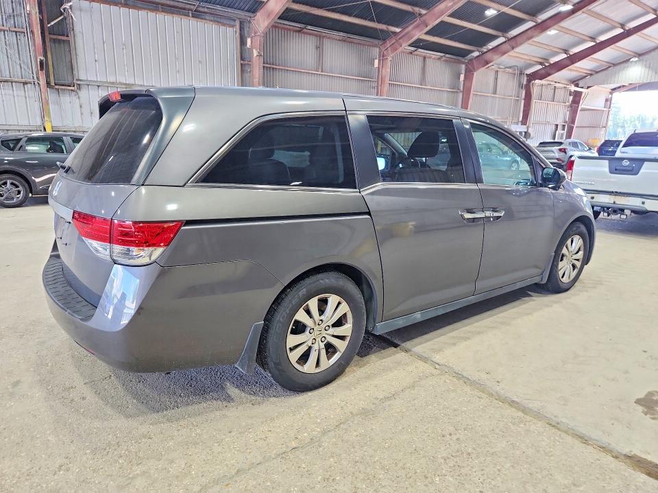 Photo 3 from auction – 2016 HONDA ODYSSEY with VIN 5FNRL5H62GB123055