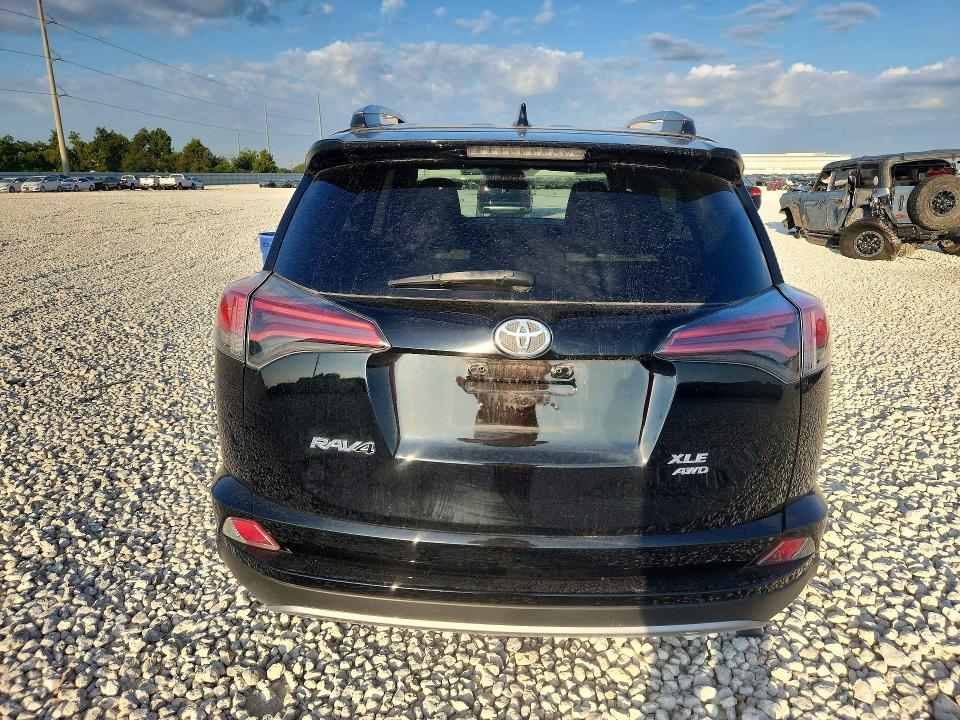 Photo 6 from auction – 2017 TOYOTA RAV4 with VIN 2T3RFREV7HW650210