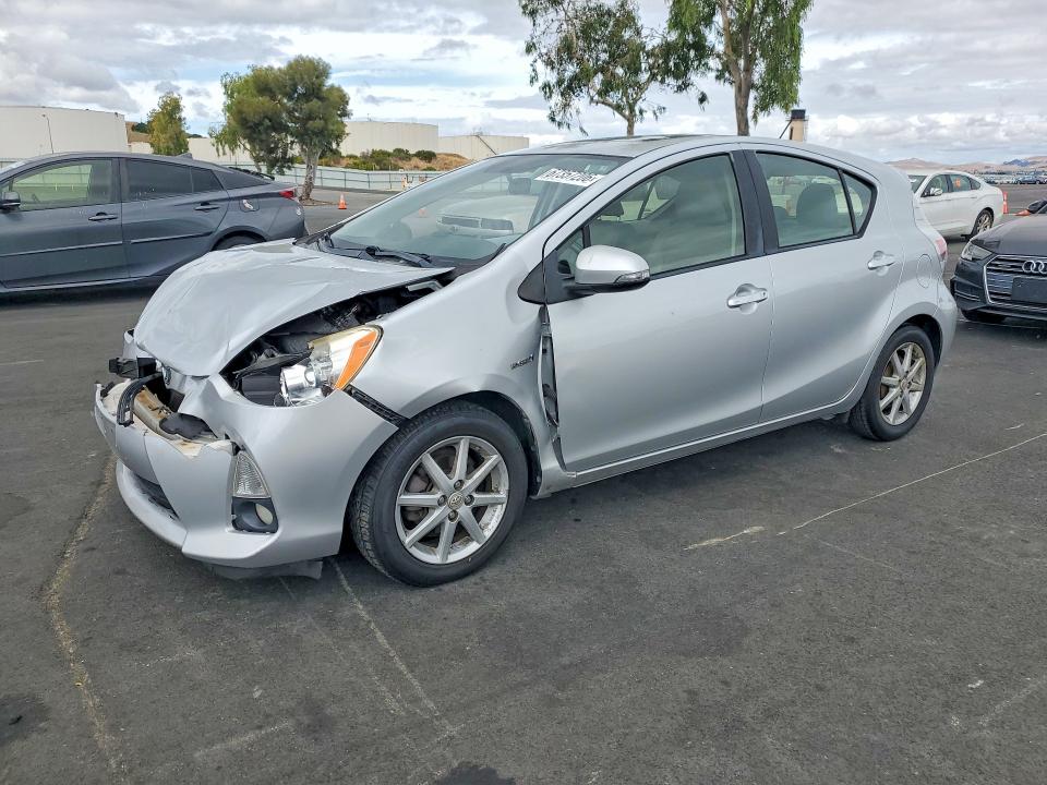 TOYOTA PRIUS C 2014 with VIN JTDKDTB30E1063414 - Photo from auction