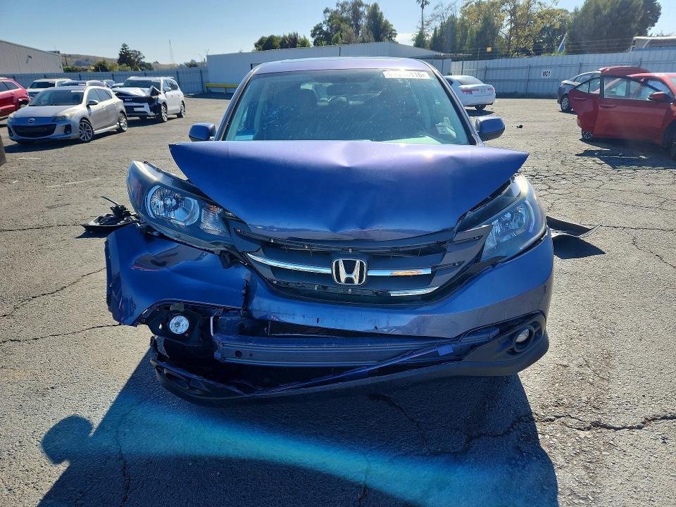Photo 5 from auction – 2014 HONDA CR-V with VIN 2HKRM3H50EH506080