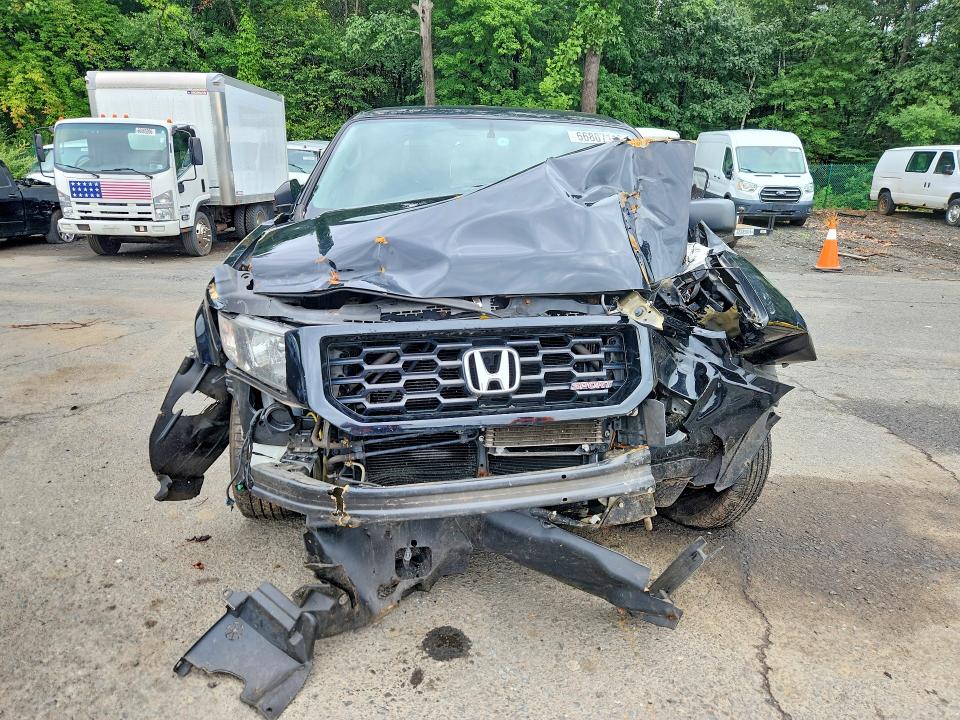 Photo 5 from auction – 2013 HONDA RIDGELINE with VIN 5FPYK1F73DB006574