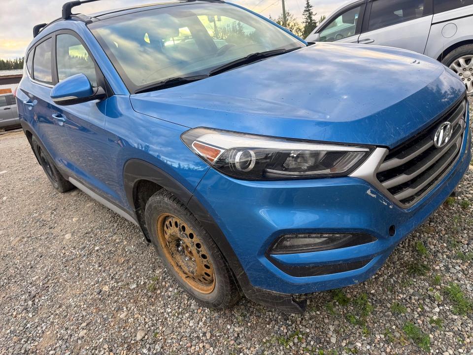 Photo 4 from auction – 2017 HYUNDAI TUCSON with VIN KM8J3CA40HU429931
