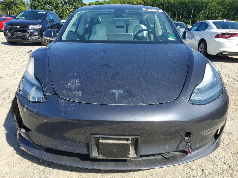 Photo 5 from auction – 2018 TESLA MODEL 3 with VIN 5YJ3E1EB1JF097212