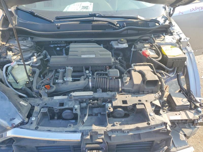 Photo 12 from auction – 2018 HONDA CR-V with VIN 7FARW2H52JE077249