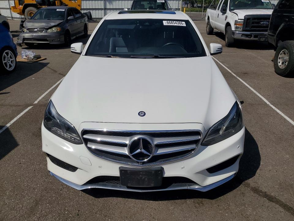 Photo 5 from auction – 2014 MERCEDES-BENZ E with VIN WDDHF5KB9EB049440