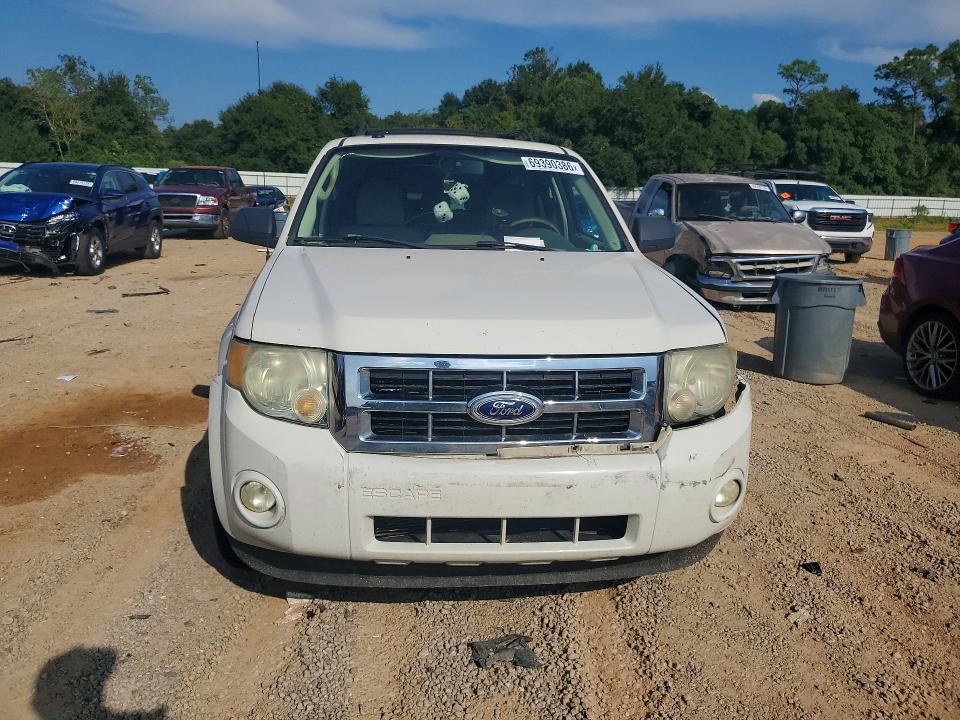 Photo 5 from auction – 2011 FORD ESCAPE with VIN 1FMCU0D76BKA04016