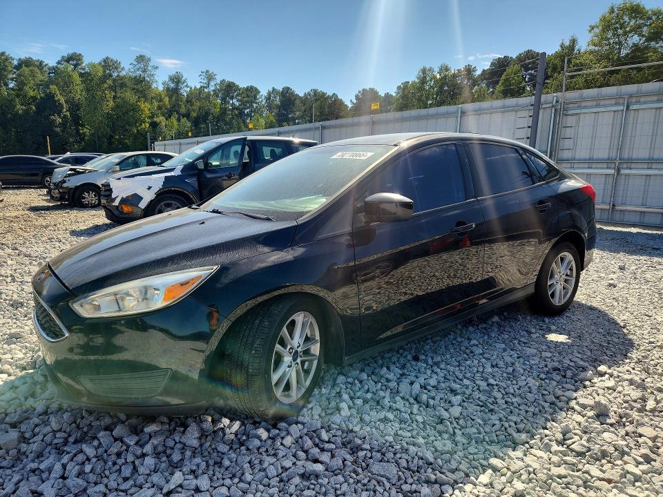 FORD FOCUS 2018 with VIN 1FADP3F24JL279983 - Photo from auction
