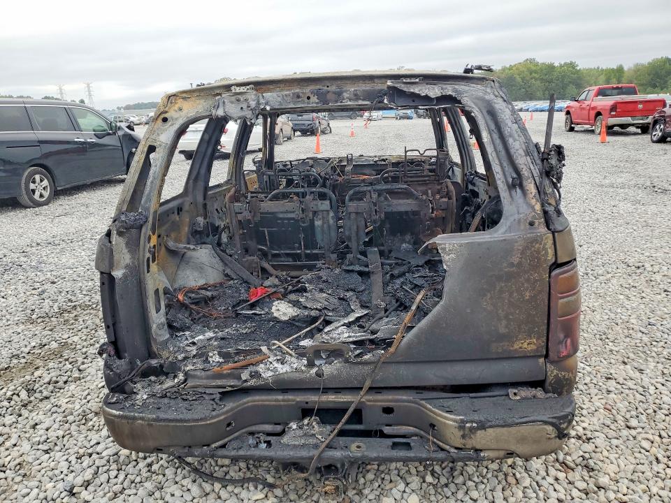 Снимка 6 от търг – 2003 GMC YUKON с VIN 1GKEC13ZX3R105842
