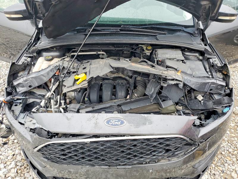 Photo 11 from auction – 2016 FORD FOCUS with VIN 1FADP3F28GL295032