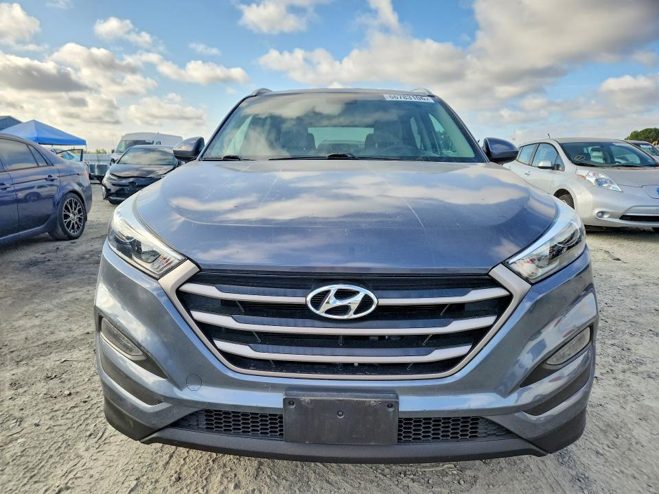 Photo 5 from auction – 2016 HYUNDAI TUCSON with VIN KM8J33A44GU228807