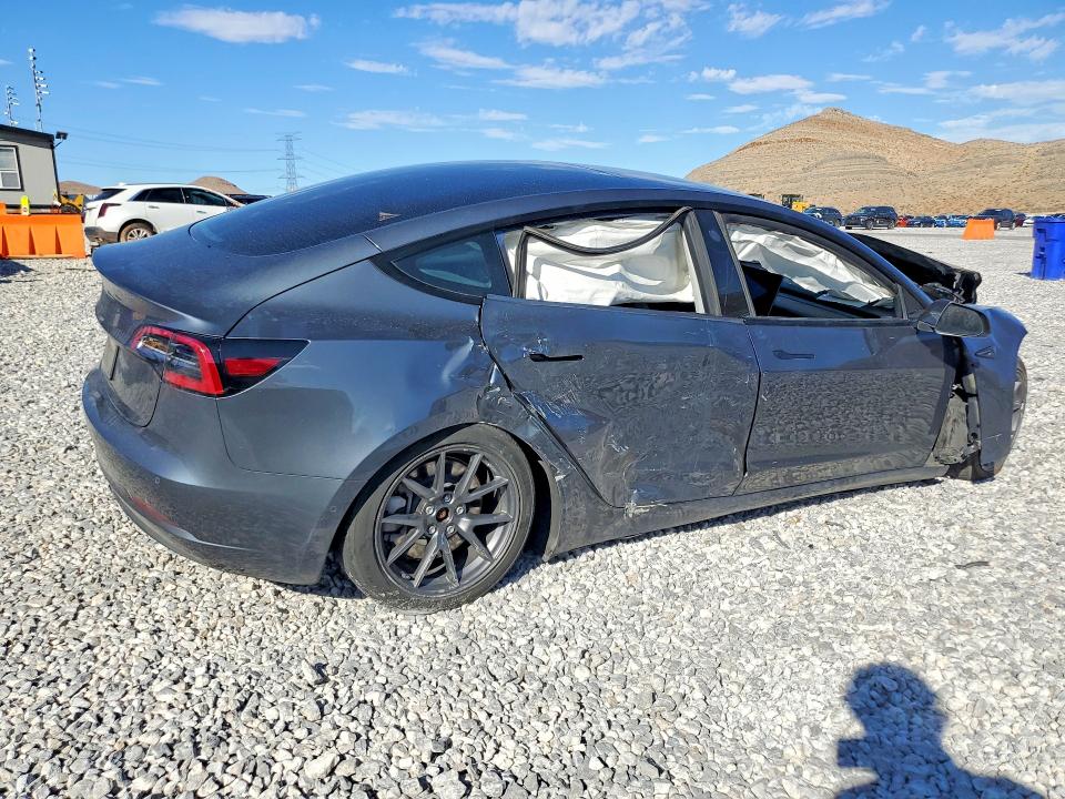 Снимка 3 от търг – 2021 TESLA MODEL 3 с VIN 5YJ3E1EA4MF045441