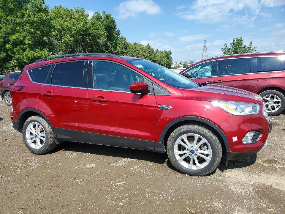 Photo 4 from auction – 2019 FORD ESCAPE with VIN 1FMCU9HD6KUC12650
