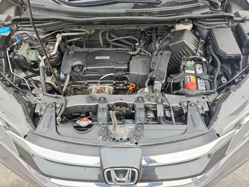 Photo 11 from auction – 2016 HONDA CR-V with VIN 5J6RM4H35GL093215