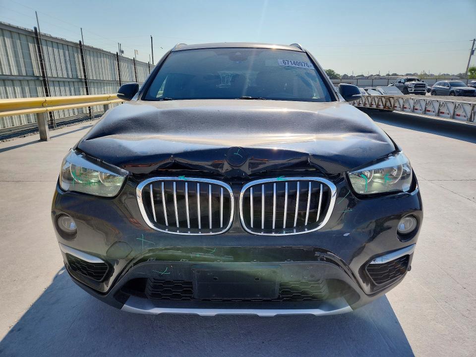 Photo 5 from auction – 2019 BMW X1 with VIN WBXHU7C54K5L11091