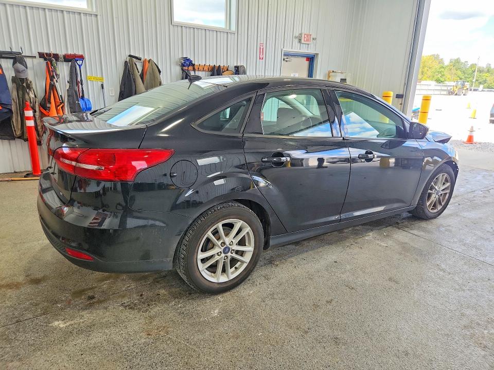 Photo 3 from auction – 2018 FORD FOCUS with VIN 1FADP3F22JL318733