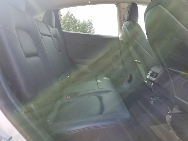 Photo 11 from auction – 2022 TESLA MODEL Y with VIN 7SAYGDEE8NF320477