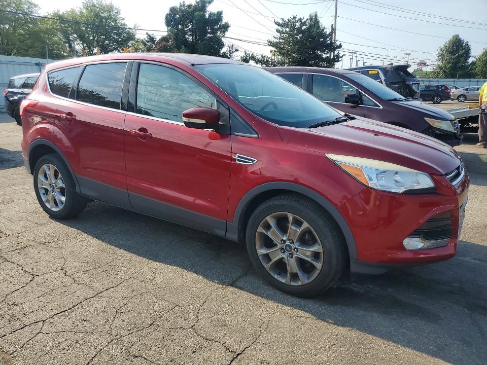 Photo 4 from auction – 2013 FORD ESCAPE with VIN 1FMCU0HX6DUA61530