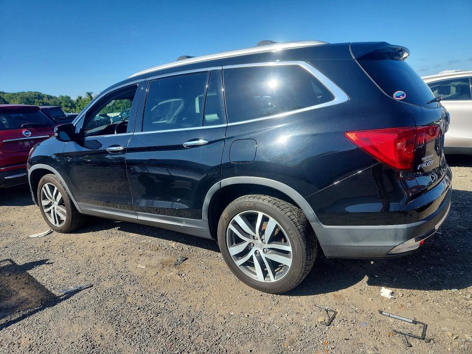 Photo 2 from auction – 2016 HONDA PILOT with VIN 5FNYF6H09GB063232