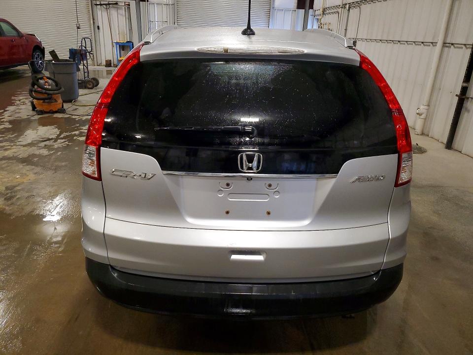 Photo 6 from auction – 2014 HONDA CR-V with VIN 2HKRM4H79EH701117